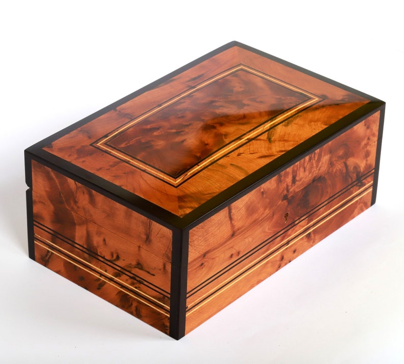 Hand-carved thuya wooden jewelry box with beautiful burl pattern, inlaid with black and yellow cedar wood engraved lines on the top and the sides