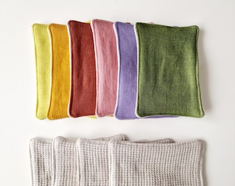 May include: Set of 10 reusable makeup remover pads.  The pads are made of natural linen and come in a variety of colors, including green, yellow, purple, and beige.