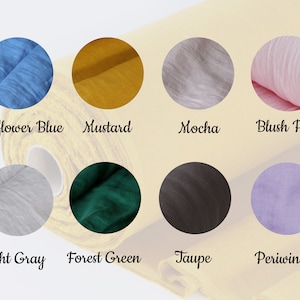 Peut inclure: Un rouleau de tissu avec des &eacute;chantillons de couleurs vari&eacute;es, dont Bleu Bleuet, Moutarde, Moka, Rose P&acirc;le, Gris Clair, Vert For&ecirc;t, Taupe et Pervenche. Les &eacute;chantillons sont pr&eacute;sent&eacute;s dans des cercles, avec les noms de couleurs.