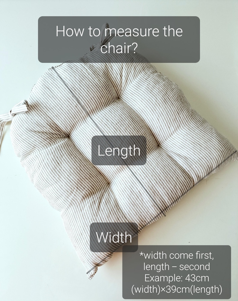 Graphic guide on how to measure a chair for a striped linen seat cushion. The image shows a square, tufted grey and white striped kitchen chair pad on a white table. Three dark grey text boxes explain the dimensions: 'Length' indicates the vertical measurement, 'Width' shows the horizontal front edge, and a note explains that width comes first (e.g., 43cm width by 39cm length).