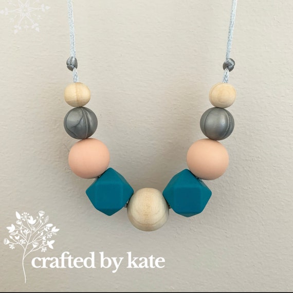 Blue with a hint of peach silicone bead necklace