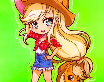 May include: A colorful acrylic stand featuring a cartoon character with blonde hair wearing a red shirt, blue jeans, and a brown cowboy hat. The character is standing with one hand on her hip and the other holding a red apple. A smaller cartoon pony with blonde hair is sitting beside her. The stand has a yellow base with red apples.