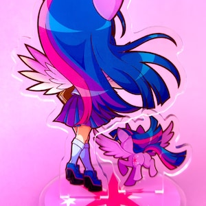 May include: A pink and blue anime-style character with wings and a unicorn horn. The character is wearing a purple and black school uniform and is standing on a pink base with white stars. The character is holding a book in their hand. A smaller version of the character is standing behind the larger character.