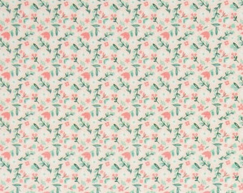 May include: A white fabric with a repeating pattern of small pink flowers and green leaves. The fabric is shown with a ruler for scale.