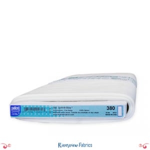 May include: A roll of white Pellon 380 Soft-N-Stay embroidery cut away fabric. The label reads "100% Nylon" and "20 in" wide. The product is made in the USA. The label also includes the website www.PellonProjects.com.