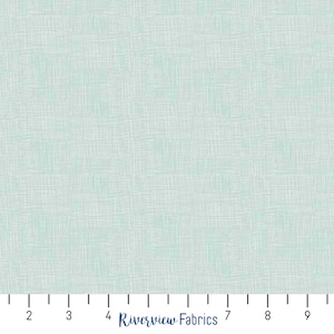 May include: A light blue fabric with a subtle woven texture. The fabric is measured in inches, with markings from 1 to 10.