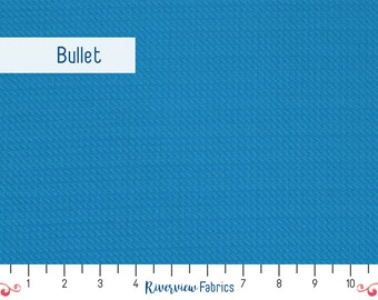 May include: A close-up of a solid blue fabric with a textured surface. The fabric is labeled "Bullet". A ruler is visible at the bottom of the image, with markings from 1 to 10.
