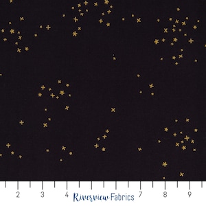 May include: Black fabric with a scattered pattern of gold stars and plus signs.