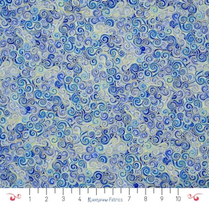 May include: A fabric with a repeating pattern of blue and light blue swirls on a cream background. The fabric is marked with a ruler and the text "Riverview Fabrics".