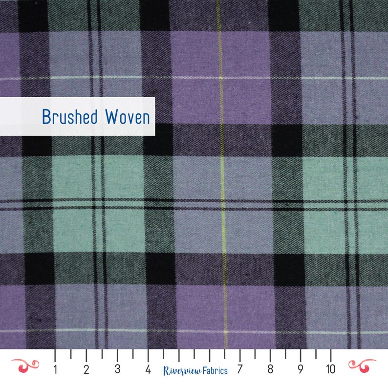 May include: Brushed woven fabric with a plaid pattern in shades of purple, teal, black, and white. A yellow stripe runs vertically through the design. The text "Brushed Woven" is displayed on a white rectangle.