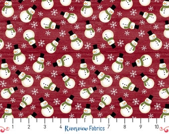 May include: A red fabric with a repeating pattern of white snowmen with black hats and green scarves. The snowmen are surrounded by white snowflakes.