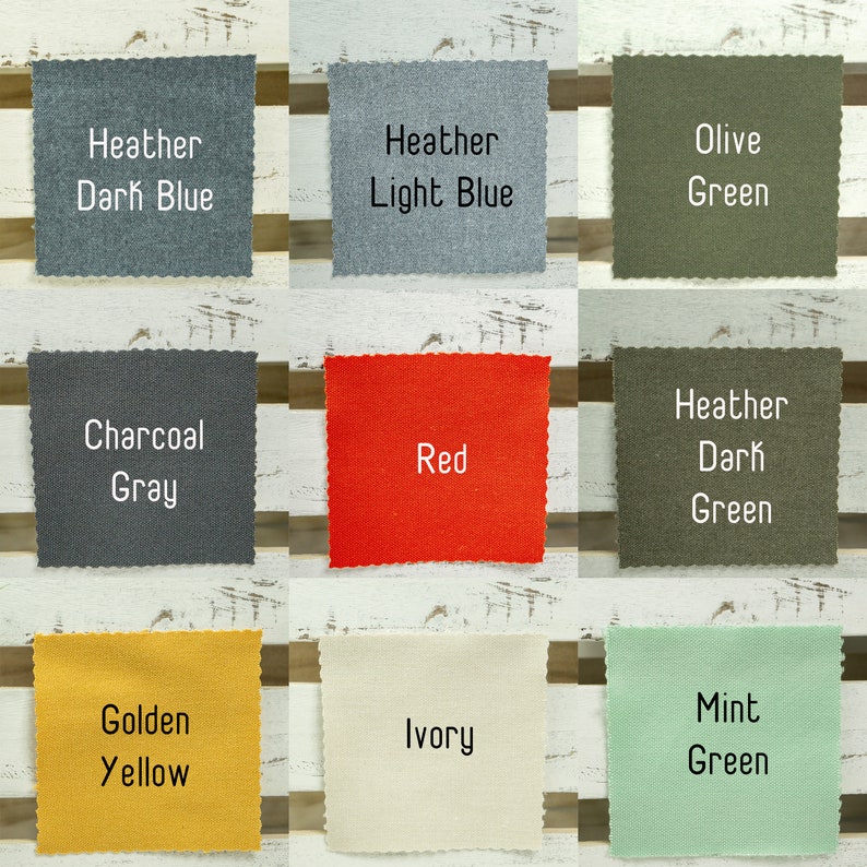K&ouml;nnte beinhalten: Neun Stoffmuster in verschiedenen Farben und Texturen, darunter dunkelblauer Melange, hellblauer Melange, Olivgr&uuml;n, Anthrazitgrau, Rot, dunkelgr&uuml;ner Melange, Goldgelb, Elfenbein und Mintgr&uuml;n.