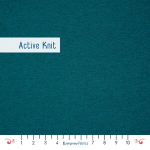 May include: Teal-colored active knit fabric. The fabric has a textured surface and the words "Active Knit" are displayed on a white rectangular label. A ruler is at the bottom of the image.