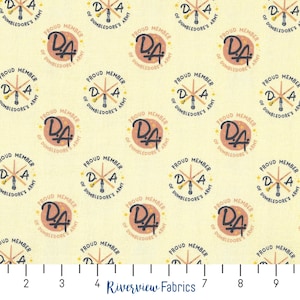 May include: A yellow fabric with a repeating pattern of pink circles. Each circle contains a black and white illustration of a wand and the text "Proud Member of Dumbledore's Army" and "DA".