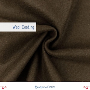 May include: Close-up of a swatch of brown wool coating fabric. The fabric is folded, showing the texture and depth of the material. The text "Wool Coating" is displayed on a white rectangle.