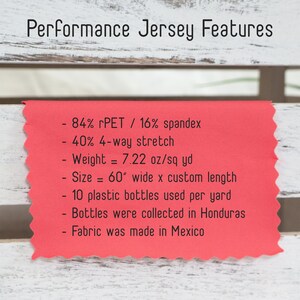 May include: A close-up of a red fabric swatch with the text "Performance Jersey Features" and details about the fabric's composition, stretch, weight, size, and origin. The fabric is made from 84% recycled polyethylene terephthalate (rPET) and 16% spandex, has a 4-way stretch, weighs 7.22 ounces per square yard, is 60 inches wide, and is made in Mexico.