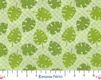 May include: Fabric with a repeating pattern of green monstera leaves on a light green and white checkered background. The fabric has a textured appearance and is suitable for various crafting projects. The text "Riverview Fabrics" is visible.