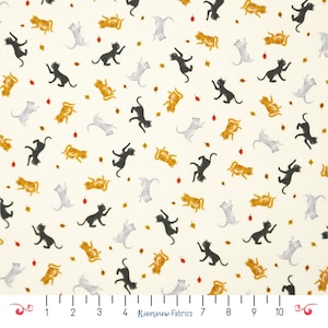 May include: Cream-coloured fabric featuring a repeating pattern of black, grey, and orange cats in various poses, interspersed with orange and red leaves. The fabric has a playful, autumnal theme, ideal for crafting or home decor projects.