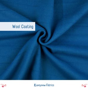 May include: Close-up of a teal wool coating fabric swatch. The fabric is folded, revealing its texture and depth. The words "Wool Coating" are in a white rectangle. The Riverview Fabrics logo is at the bottom.