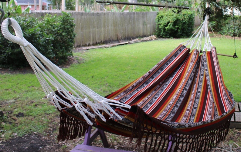 Hammocks are one of the most relaxing things you can have in your yard. Here are 10 inviting backyard ideas for all types of gatherings.