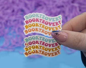 Holografische sticker Booktrovert | Kindle-stickers | Stickers boekenliefhebber | Leuke Kindle-sticker | Bookish-merchandise |Technisch accessoire