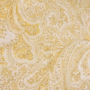 107/108" Cotton Yellow, light tan paisley flowers & leaves on a white background by Barnatex - SOLD by the  1/2 yard - cut CONTINUOUSLY