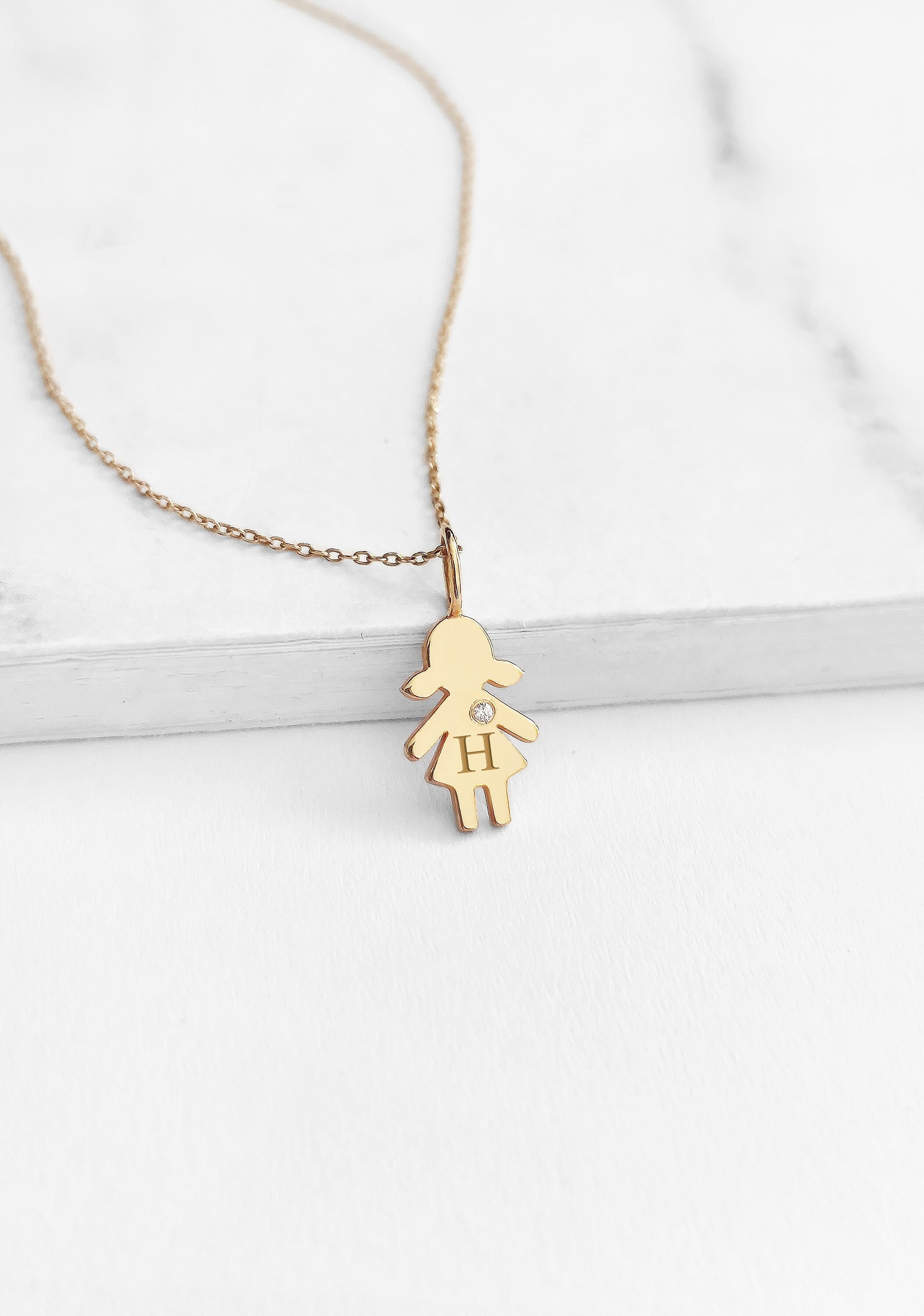 Baby girl charm best sale necklace