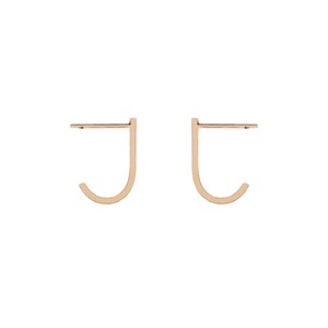 May include: A pair of gold-toned hoop earrings with a simple, minimalist design. The earrings are made of a thin, curved metal that forms a small hoop.
