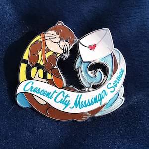 Cuddle messenger- Crescent city officially licensed enamel pin