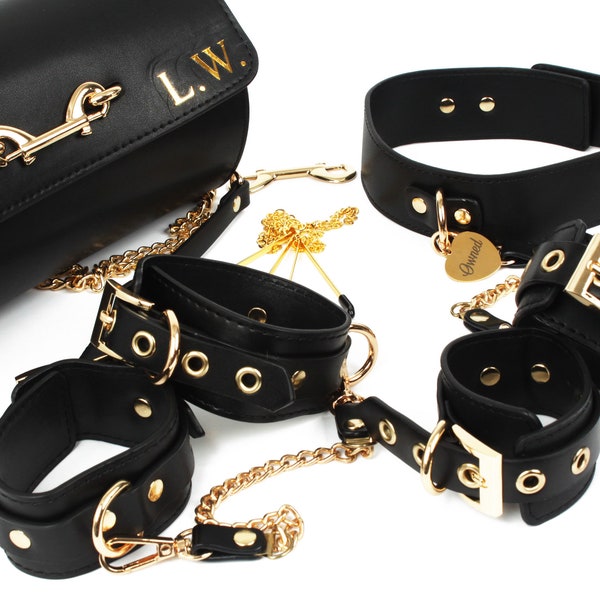 Genuine leather bondage kit in black with gold fixings. Personalised with your Dom's initials. BDSM bondage set with owned tag