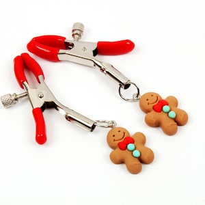 Festive Silver & Red Nipple Clamps with Christmas Gingerbread Charm - Perfect for Holiday Fun