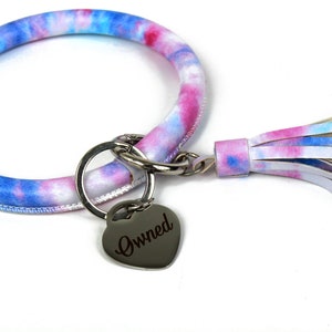 Owned keychain. Tie dye style faux leather with owned tag. Perfect gift for your slave or submissive!