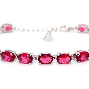 Silver Ruby Oval Cut 24.02ct Tennis Bracelet (925)