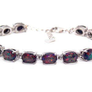 Silver Black Fire Opal Oval Cut 24.02ct Tennis Bracelet (925)