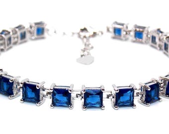 Silver Blue Sapphire Princess Cut 22.89ct Tennis Bracelet