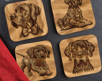 May include: Four wood coasters with laser-engraved images of Bloodhound dogs. The coasters are square and have a light brown wood finish. The images are in black and white and show the dogs in different poses. The text ".SVG .PNG files" is printed on the bottom right corner of the image.