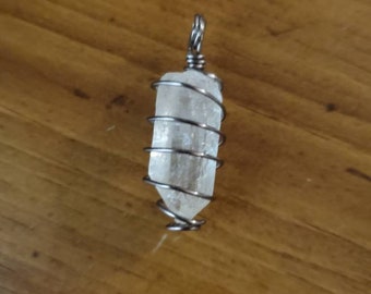 Clear quartz hand wrapped with coated copper