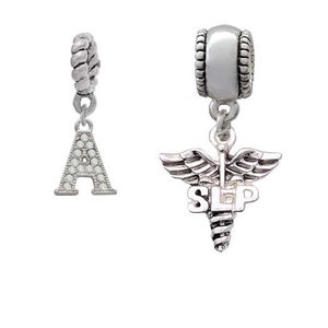 May include: Silver charm bracelet with a silver charm that says "SLP" and a silver charm with the letter "A" covered in clear rhinestones.