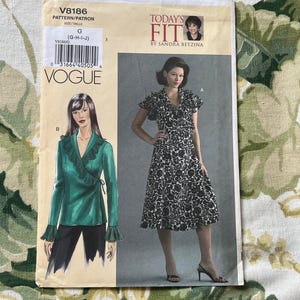 May include: A sewing pattern for a dress and a blouse. The pattern is from Vogue and is called "Today's Fit" by Sandra Betzina. The pattern number is V8186 and the size is G (G-H-I-J).