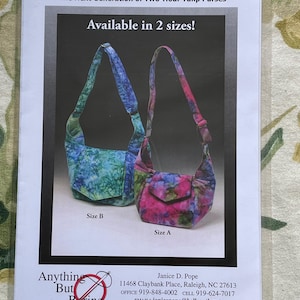 May include: A sewing pattern for a Long-Stemmed Tulip Purse. The pattern includes instructions for two sizes, A and B. The pattern is available from Janice D. Pope, 11468 Claybank Place, Raleigh, NC 27613. The pattern is available on the website www.twohourtulip.com.