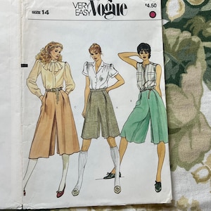 May include: A vintage Vogue sewing pattern for culottes, size 14. The pattern features three women wearing different versions of the culottes, with a white blouse and knee-high socks. The pattern is labeled "Very Easy" and costs $4.50.
