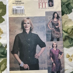 May include: A sewing pattern for a women's top with three different styles. The pattern is from Today's Fit by Sandra Betzina and is size G, H, I, J. The pattern number is 7694.