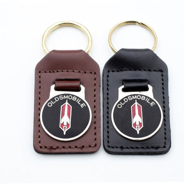 Oldsmobile Emblem On A Genuine Leather Fob Available In Brown Or Black