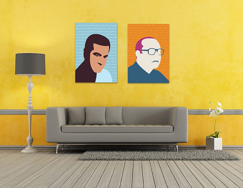 May include: Two framed portraits of men, one with a blue background and the other with an orange background, hanging on a yellow wall above a gray sofa.