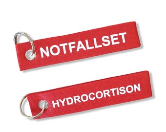 Sleutelhanger FELT Motief Noodpakket Hydrocortison Note Allergie Anafylaxie