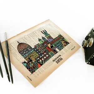 May include: A colorful illustration of the Palacio da Pena in Sintra, Portugal, printed on a vintage book page. The illustration is in a whimsical style with geometric shapes and patterns. The text "Palacio da Pena, Sintra" is printed below the illustration.