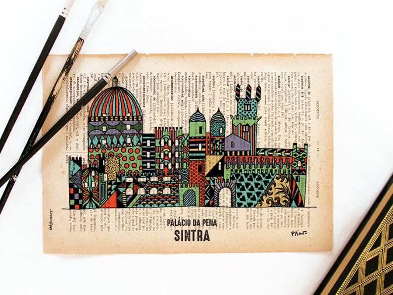 May include: A colorful illustration of the Palacio da Pena in Sintra, Portugal. The illustration is done in a geometric style with a variety of colors and patterns. The text "PALACIO DA PENA SINTRA" is printed below the illustration.