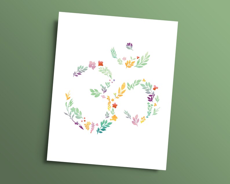 May include: A white background with a colorful floral design in the shape of the Om symbol.