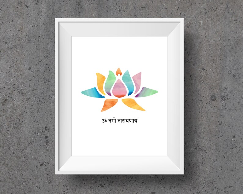 May include: A white framed print with a watercolor illustration of a colorful lotus flower. The text "Om Namo Narayanaya" is written in Sanskrit below the flower.
