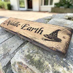 Middle Earth themed rustic wooden house sign with engraved wizard hat